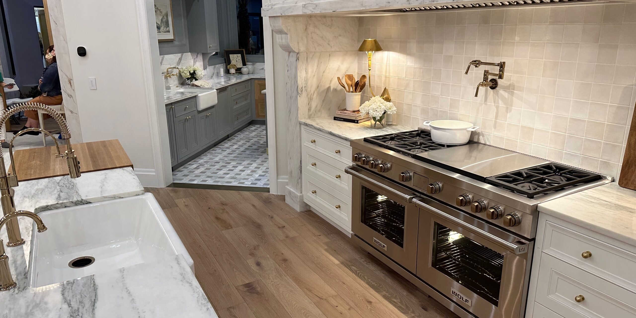 Metallic Thresholds Parade of Homes 001 Metallic thresholds separate the kitchen from the pantry at the KH Traveler entry in the 2024 St. George Area Parade of Homes.